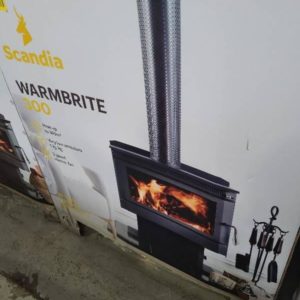 SCANDIA WARMBRITE 300 WOOD HEATER WITH WOOD STACKER BELOW HEATS UP TO 320M2 3 SPEED ELECTRIC FAN RRP$1799 *CARTON DAMAGE STOCK* 3 MONTH WARRANTY SCWB300-3-19-0246