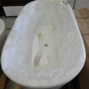 AGED STOCK FREESTANDING BATH SOLD AS IS