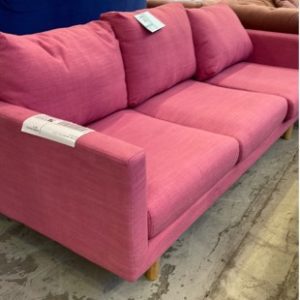 EX HIRE PINK MATERIAL COUCH SOLD AS IS