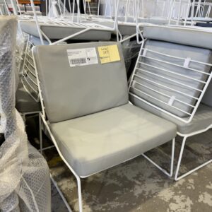 EX HIRE WHITE WIRE OUTDOOR ARM CHAIR WITH GREY CUSHIONS SOLD AS IS