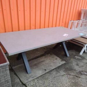 EX DISPLAY LARGE CROSS LEG CONCRETE STYLE OUTDOOR TABLE SOLD AS IS