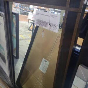 EX STAGING BLACK AND GOLD FRAMED MIRROR SOLD AS IS