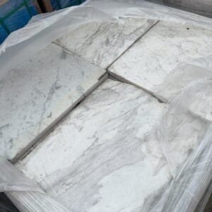 PALLET OF MARBLE TILE SOME DAMAGED CORNERS SOLD AS IS