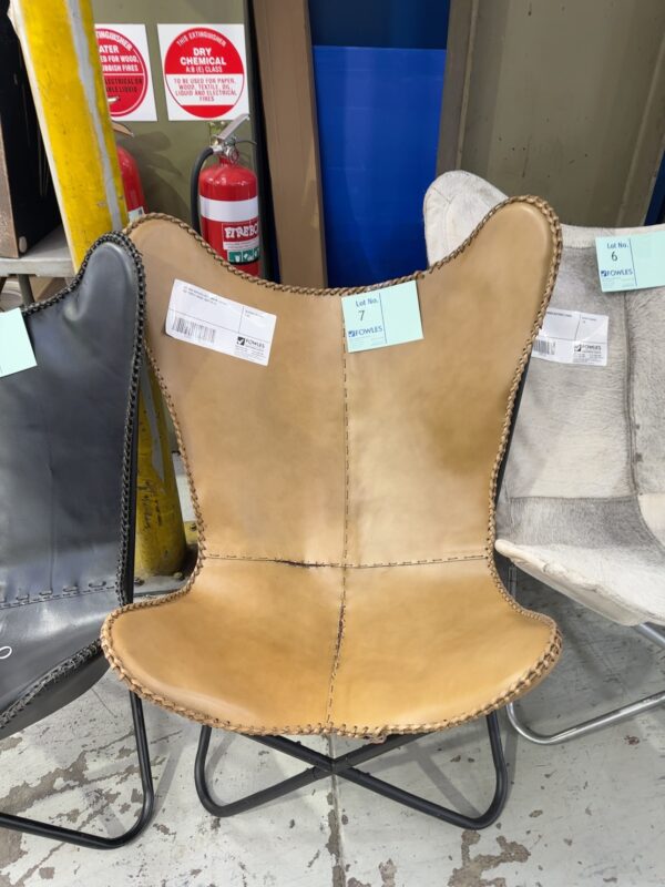EX HIRE REPLICA LIGHT BROWN LEATHER BUTTERFLY CHAIR, SOLD AS IS