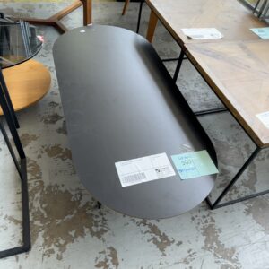 EX HIRE BLACK LAMINATE OVAL COFFEE TABLE, SOLD AS IS