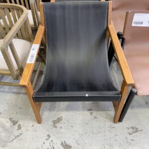 EX HIRE BLACK LEATHER ARMCHAIR WITH TEAK FRAME, SOLD AS IS