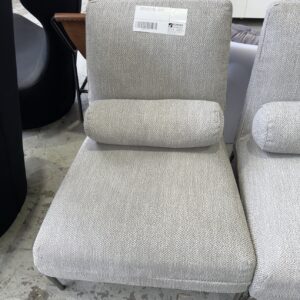 EX HIRE LIGHT GREY UPHOLSTERED LOUNGE CHAIR WITH BOLSTER CUSHION, SOLD AS IS