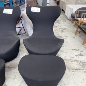 EX HIRE REPLICA BLACK UPHOLSTERED EGG SWIVEL CHAIR WITH MATCHING FOOTSTOOL, SOLD AS IS