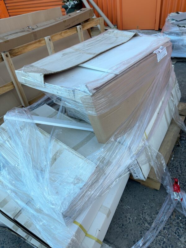 PALLET OF ASSORTED FLAT PACK LAUNDRY/KITCHEN CABINETS, SOLD AS IS