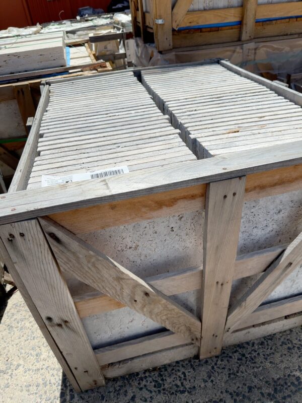 PALLET OF SILVER PREMIUM TUMBLED & UNFILLED TRAVERTINE, 610 X 406MM X 30MM, SOME VEINS, PATCHES & 2NDS WITHIN CRATES, SOLD AS IS (PALLET #11)
