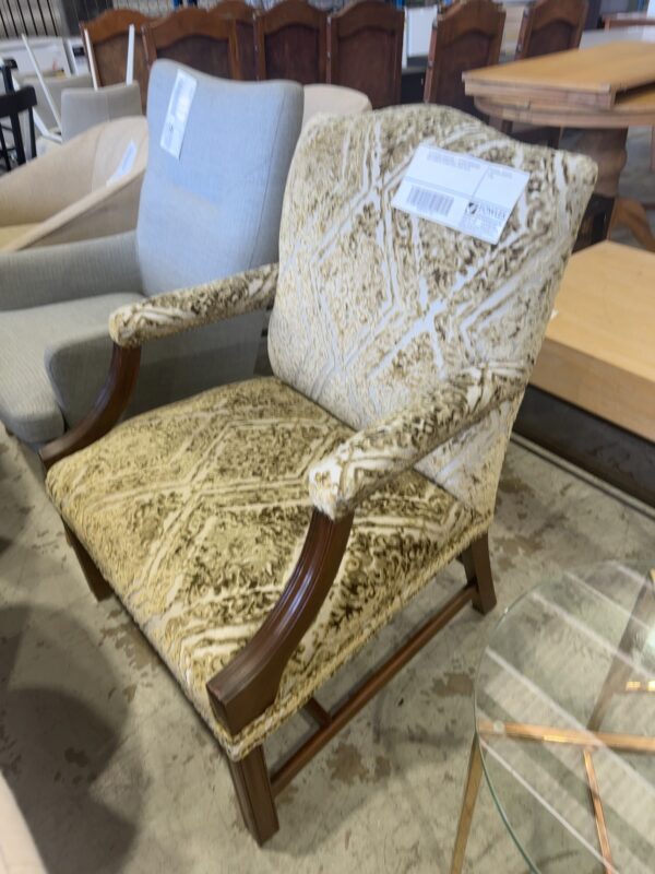 EX STAGING FURNITURE - TIMBER ARMCHAIR WITH ORNATE UPHOLSTERY, SOLD AS IS