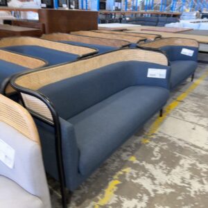 EX EVENT HIRE - BLONDE RATTAN COUCH WITH DARK BLUE UPHOLSTERY, SOLD AS IS