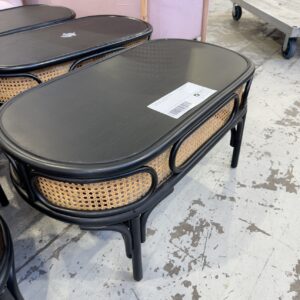 EX EVENT HIRE - BLACK & RATTAN OVAL COFFEE TABLE, SOLD AS IS