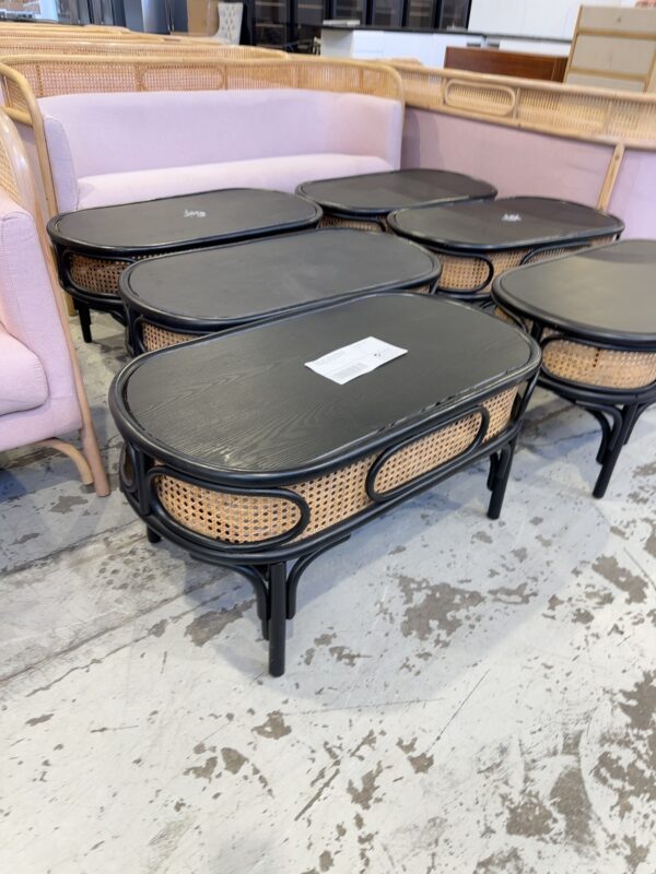 EX EVENT HIRE - BLACK & RATTAN OVAL COFFEE TABLE, SOLD AS IS **NO EDGING AROUND TABLE TOP, SOLD AS IS**