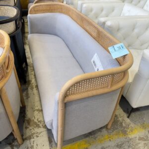 EX HIRE - LIGHT GREY COUCH WITH NATURAL CANE DETAIL, SOLD AS IS