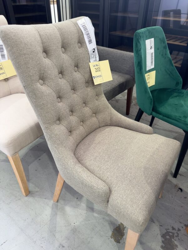 EX STAGING - BEIGE BUTTON UPHOLSTERED CHAIR, SOLD AS IS