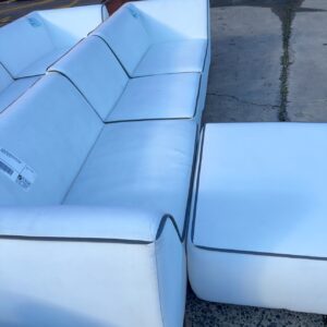 EX HIRE WHITE WITH BLACK TRIM 3 SEATER MODULAR OUTDOOR PU COUCH WITH ONE OTTOMAN, SOLD AS IS