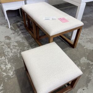 EX STAGING - LOT OF 3 CREAM AND TIMBER OTTOMAN/FOOTSTOOL, (1 X LARGE RECTANGLE & 2 SQUARE SMALL) SOLD AS IS