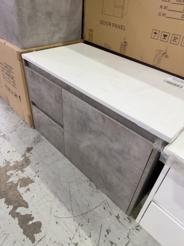 NEW LOLA WALL HUNG 900MM VANITY IN CONCRETE STYLE GREY WITH FINGER PULL LEFT HAND DRAWER,WITH PURE WHITE FLAT STONE TOP CAWH11-900L & ST56FT
