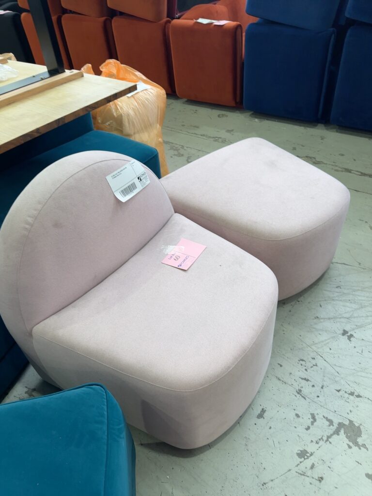 EX HIRE LIGHT PINK CURVED CHAIR AND OTTOMAN, SOLD AS IS