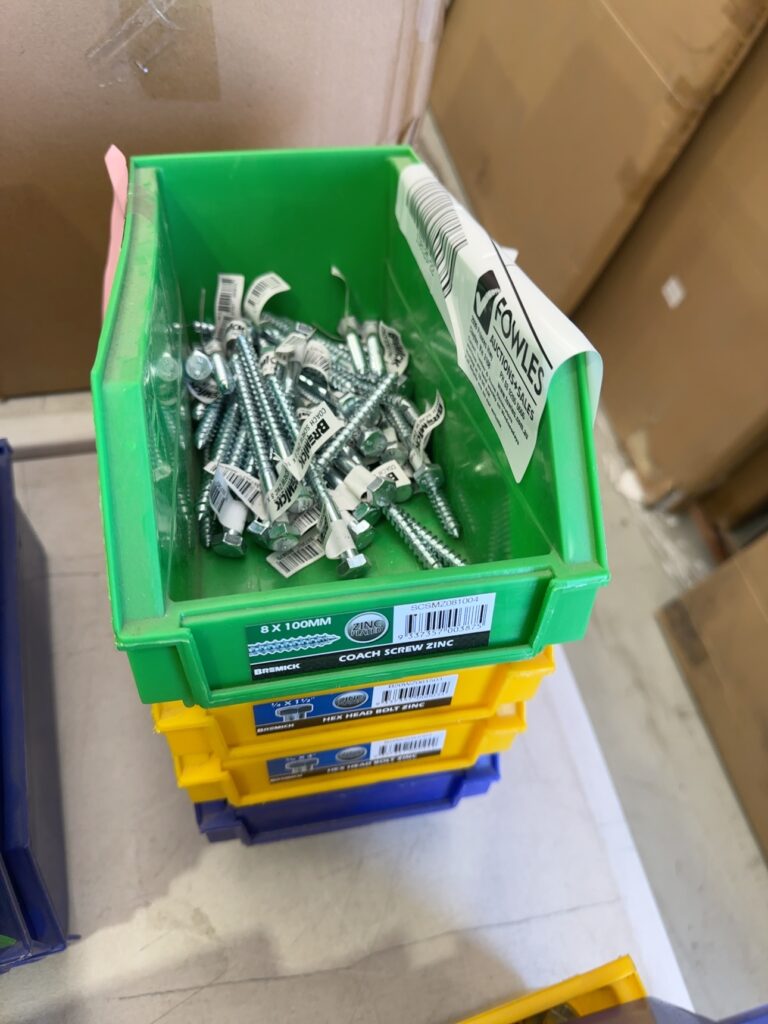 LOT OF ASSORTED HARDWARE TUBS WITH ASSORTED SCREW, NAILS ETC, SOLD AS IS