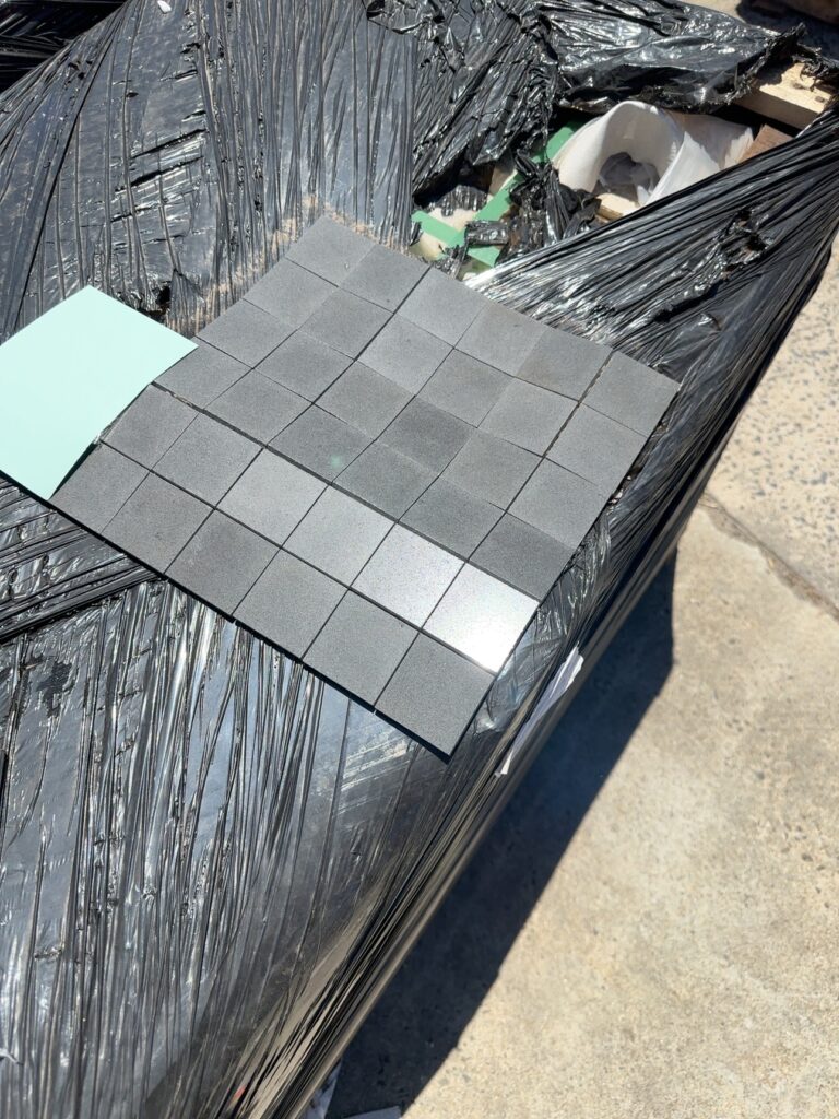 PALLET OF MICRO HOLE GREY BASALT POLISHED 600MM X 600MM X 10MM TILE, 84 PCS