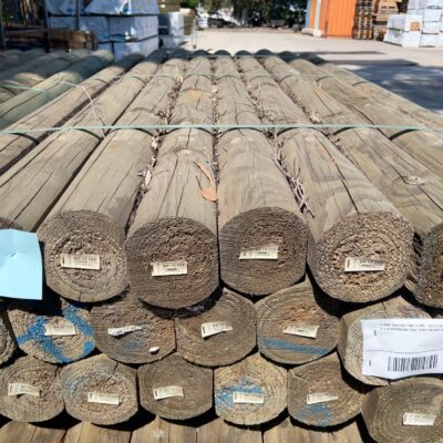 125MM TREATED PINE SLABS-26/2.4 (A SLAB IS A SUPERROUND POLE WITH SHAVED SIDES)