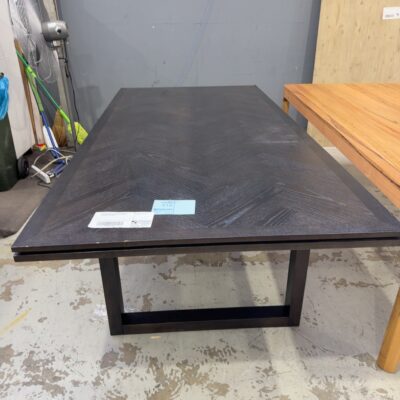 EX DISPLAY ADLEY JAPAN BLACK 2500MM HERRINGBONE DINING TABLE, CORNER DAMAGED, SOLD AS IS